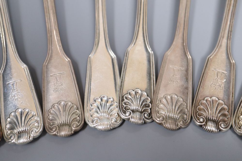 A matched set of twenty two George IV and later silver fiddle, thread and shell pattern dessert forks